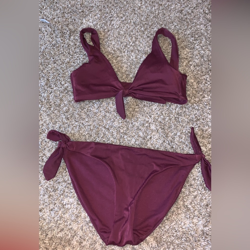 Smoke free pet free home, front tie bathing suit, comfortable. Worn once.